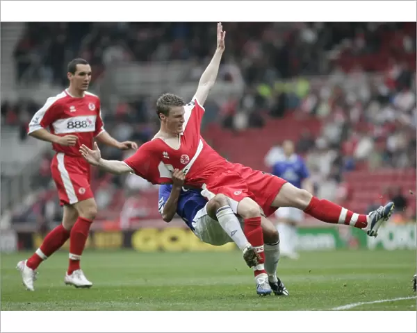The Riverside Stadium -Middlesbroughs Robert Huth is pulled to ground by Simon Davies of Everton