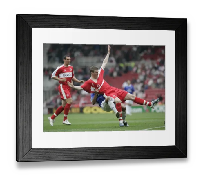 Framed Print : The Riverside Stadium -Middlesbroughs Robert Huth is pulled to ground by Simon Davies of Everton Framed Print : The Riverside Stadium -Middlesbroughs Robert Huth is pulled to ground by Simon Davies of Everton