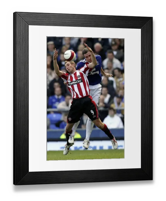 Framed Print : David Weir vs. Rob Hulse: A Battle at Everton v Sheffield United, October 21, 2006 Framed Print : David Weir vs. Rob Hulse: A Battle at Everton v Sheffield United, October 21, 2006