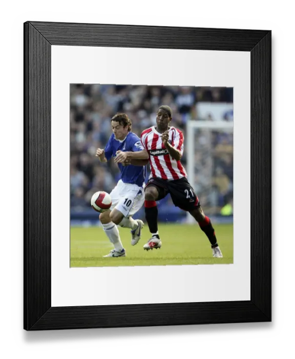 Framed Print : Football - Everton v Sheffield United FA Barclays Premiership - Goodison Park - 21 / 10 / 06 Simon Davies - Everton and Mikele Leigertwood - Sheffield United in action Mandatory Credit: Action Images / Carl Recine Livepic Framed Print : Football - Everton v Sheffield United FA Barclays Premiership - Goodison Park - 21 / 10 / 06 Simon Davies - Everton and Mikele Leigertwood - Sheffield United in action Mandatory Credit: Action Images / Carl Recine Livepic
