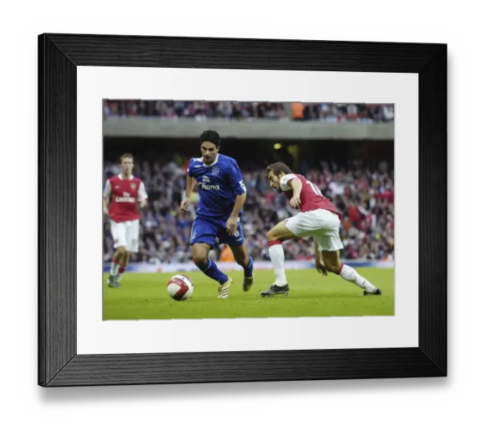 Framed Print : Clash of the Midfield Maestros: Flamini vs. Arteta, Arsenal vs. Everton (28 / 10 / 06) Framed Print : Clash of the Midfield Maestros: Flamini vs. Arteta, Arsenal vs. Everton (28 / 10 / 06)