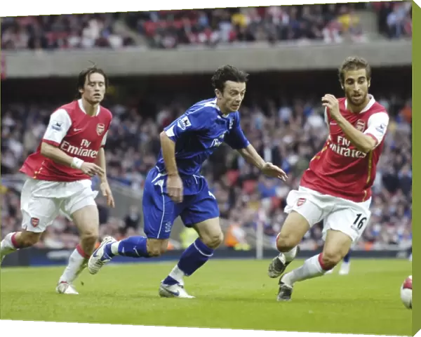 Arsenal v Everton Arsenals Mathieu Flamini and Evertons Simon Davies in action
