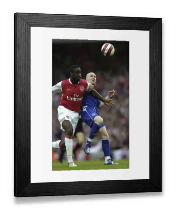 Framed Print : Arsenal v Everton Arsenals Johan Djourou and Evertons Andy Johnson challenge for the ball Framed Print : Arsenal v Everton Arsenals Johan Djourou and Evertons Andy Johnson challenge for the ball