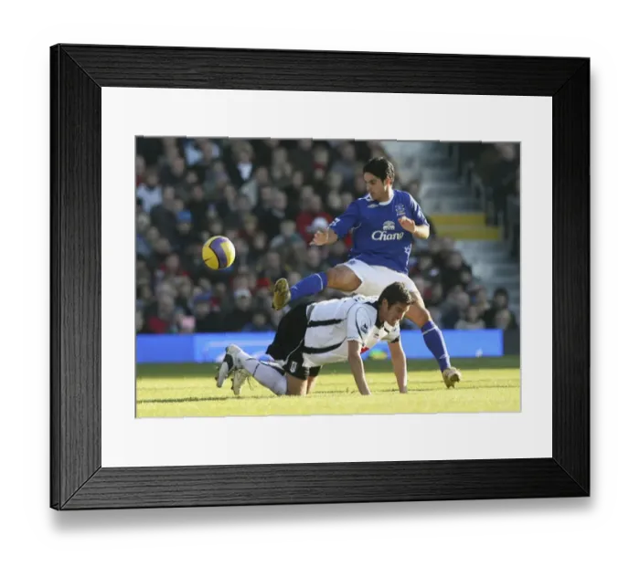 Framed Print : Fulham v Everton 4  /  11  /  06 Franck Queudrue of Fulham in action with Evertons Mikel Arteta