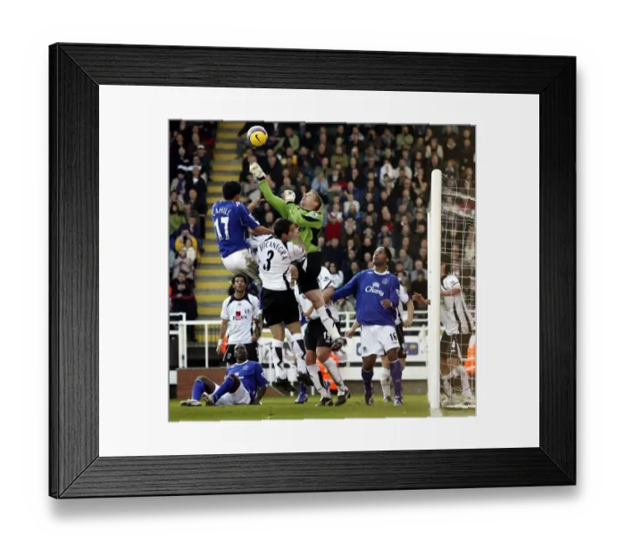 Framed Print : Fulham v Everton 4 / 11 / 06 Fulhams Antti Niemi clears the ball under pressure Framed Print : Fulham v Everton 4 / 11 / 06 Fulhams Antti Niemi clears the ball under pressure