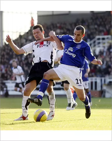 Fulham v Everton - Tomasz Radzinski of Fulham in action against Leon Osman