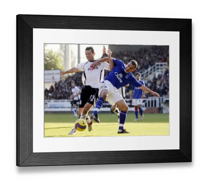 Framed Print : Radzinski vs Osman: A Football Battle at Fulham vs Everton, 4th November 2006 Framed Print : Radzinski vs Osman: A Football Battle at Fulham vs Everton, 4th November 2006