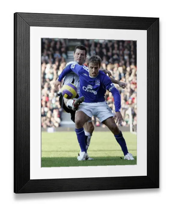 Framed Print : Fulham v Everton 4 / 11 / 06 Evertons Phil Neville in action against Fulhams Tomasz Radzinski Framed Print : Fulham v Everton 4 / 11 / 06 Evertons Phil Neville in action against Fulhams Tomasz Radzinski