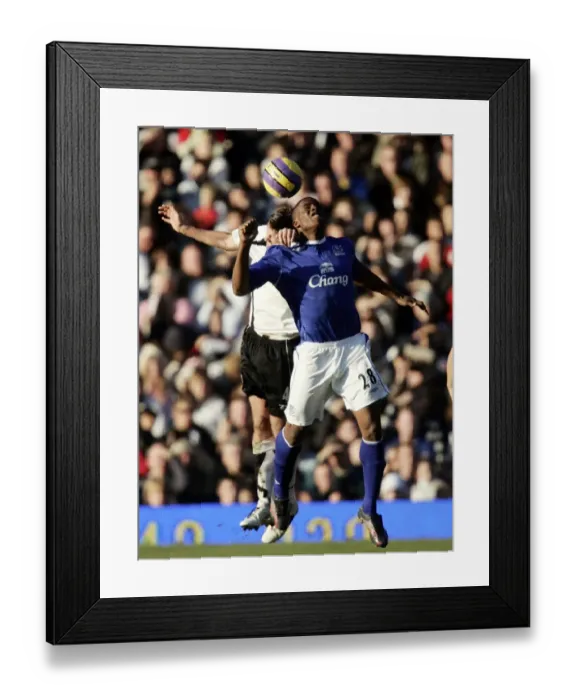 Framed Print : Fulham v Everton - 4 / 11 / 06 Evertons Victor Anichebe in action against Fulhams Franck Queudrue Framed Print : Fulham v Everton - 4 / 11 / 06 Evertons Victor Anichebe in action against Fulhams Franck Queudrue
