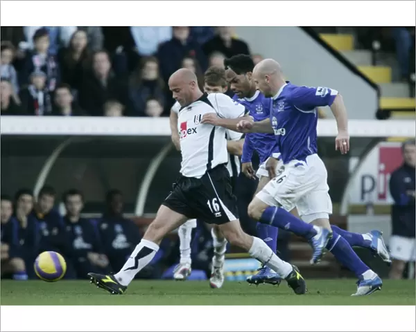 Fulham v Everton 4  /  11  /  06 Claus Jensen - Fulham in action against Joleon Lescott