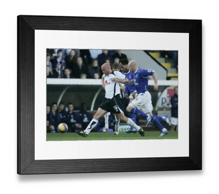Framed Print : Fulham v Everton 4 / 11 / 06 Claus Jensen - Fulham in action against Joleon Lescott Framed Print : Fulham v Everton 4 / 11 / 06 Claus Jensen - Fulham in action against Joleon Lescott