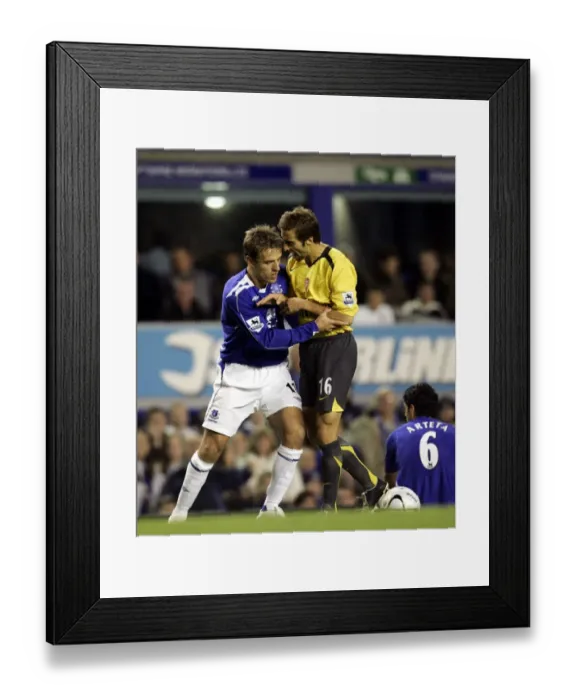 Framed Print : Everton vs. Arsenal Carling Cup Showdown: Phil Neville vs. Mathieu Flamini (November) Framed Print : Everton vs. Arsenal Carling Cup Showdown: Phil Neville vs. Mathieu Flamini (November)