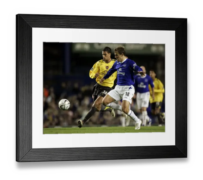 Framed Print : Everton v Arsenal Carling Cup Fourth Round Phil Neville and Jeremie Aliadiere in Framed Print : Everton v Arsenal Carling Cup Fourth Round Phil Neville and Jeremie Aliadiere in