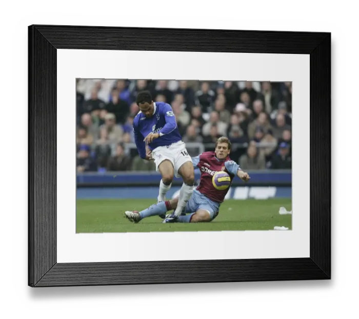 Framed Print : Everton v Aston Villa - Evertons Joleon Lescott and Aston Villas Stilian Petrov Framed Print : Everton v Aston Villa - Evertons Joleon Lescott and Aston Villas Stilian Petrov