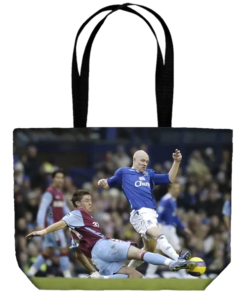 Everton v Aston Villa - Evertons Andrew Johnson and Aston Villas Gary Cahill