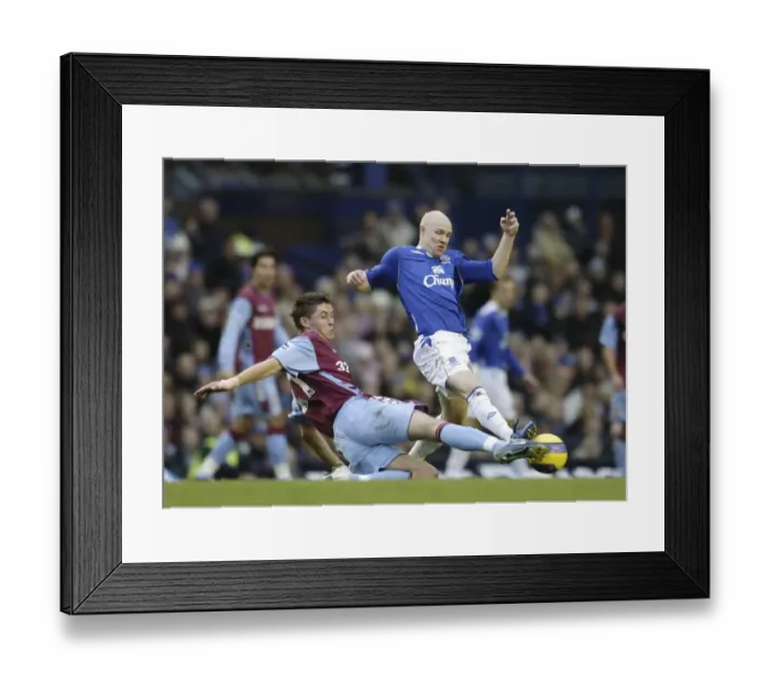 Framed Print : Everton v Aston Villa - Evertons Andrew Johnson and Aston Villas Gary Cahill Framed Print : Everton v Aston Villa - Evertons Andrew Johnson and Aston Villas Gary Cahill