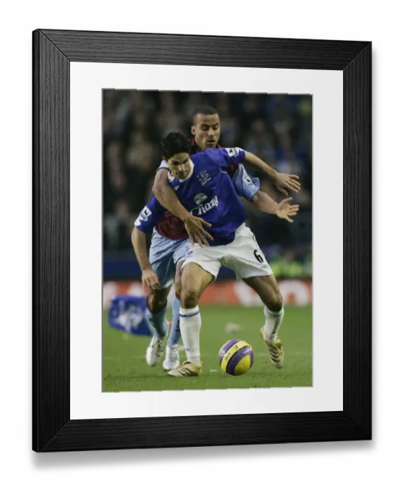 Framed Print : Everton's Mikel Arteta vs. Aston Villa's Gabriel Agbonlahor: A Football Rivalry Unfolds (Everton v Aston Villa) Framed Print : Everton's Mikel Arteta vs. Aston Villa's Gabriel Agbonlahor: A Football Rivalry Unfolds (Everton v Aston Villa)