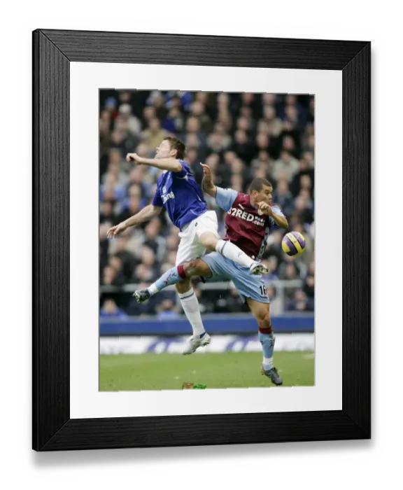 Framed Print : Everton vs. Aston Villa: James Beattie vs. Wilfred Bouma - Football Rivalry Framed Print : Everton vs. Aston Villa: James Beattie vs. Wilfred Bouma - Football Rivalry