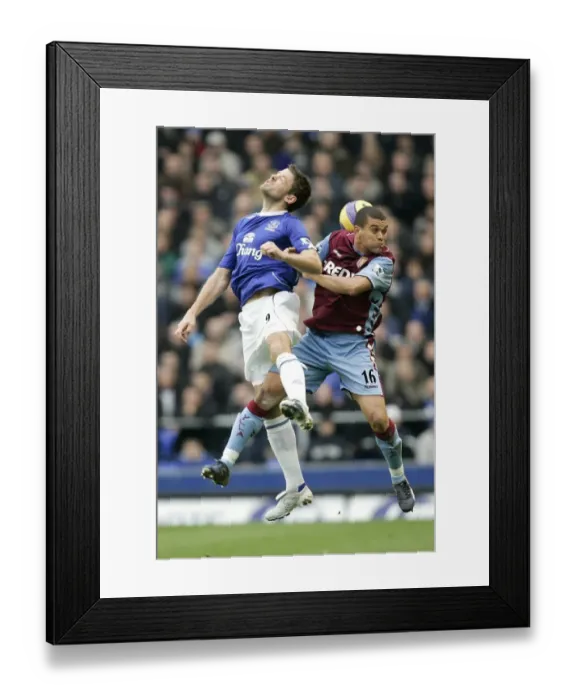 Framed Print : Beattie vs Bouma: Clash of the Titans in Everton vs Aston Villa (06 / 07) FA Premiership Framed Print : Beattie vs Bouma: Clash of the Titans in Everton vs Aston Villa (06 / 07) FA Premiership