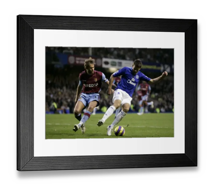 Framed Print : Beattie vs Mellberg: Everton vs Aston Villa Clash in the FA Barclays Premiership (06 / 07) Framed Print : Beattie vs Mellberg: Everton vs Aston Villa Clash in the FA Barclays Premiership (06 / 07)