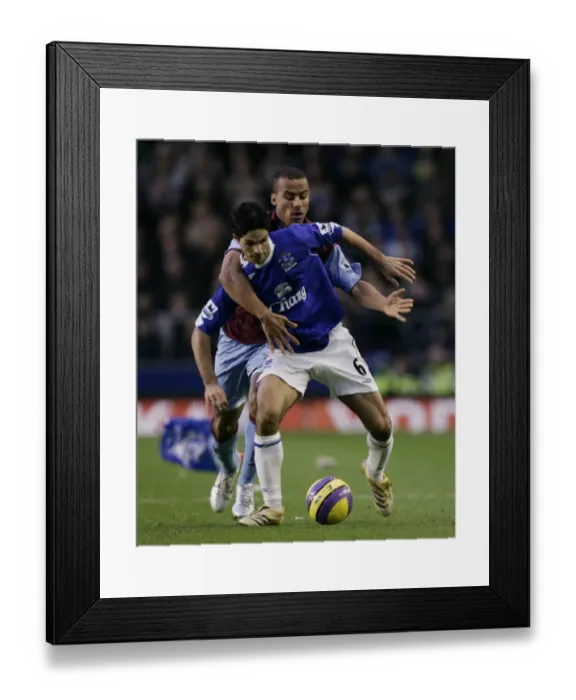 Framed Print : Everton v Aston Villa Evertons Mikel Arteta in action against Aston Villas Gabriel Agbonlahor Framed Print : Everton v Aston Villa Evertons Mikel Arteta in action against Aston Villas Gabriel Agbonlahor