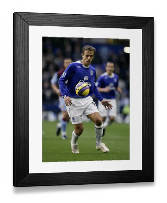 Framed Print : Phil Neville in Action: Everton vs Aston Villa Framed Print : Phil Neville in Action: Everton vs Aston Villa