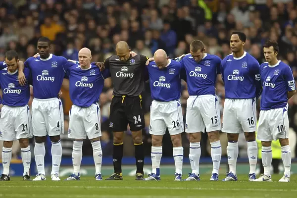 Everton v Aston Villa Everton players line up for a two minute silence to mark Armistice Day