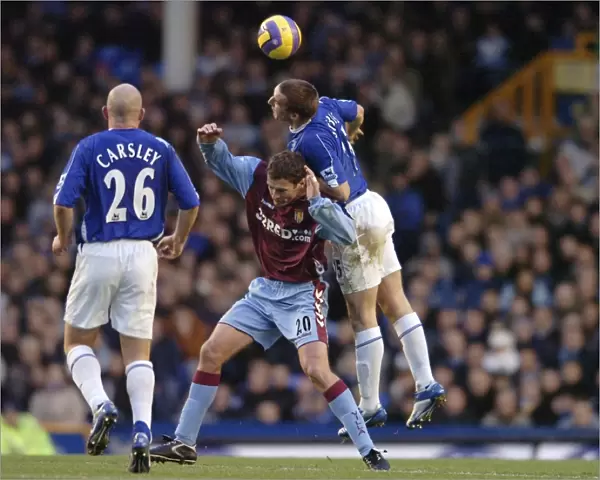 Everton v Aston Villa Alan Stubbs and Chris Sutton - Aston Villa battle for the ball