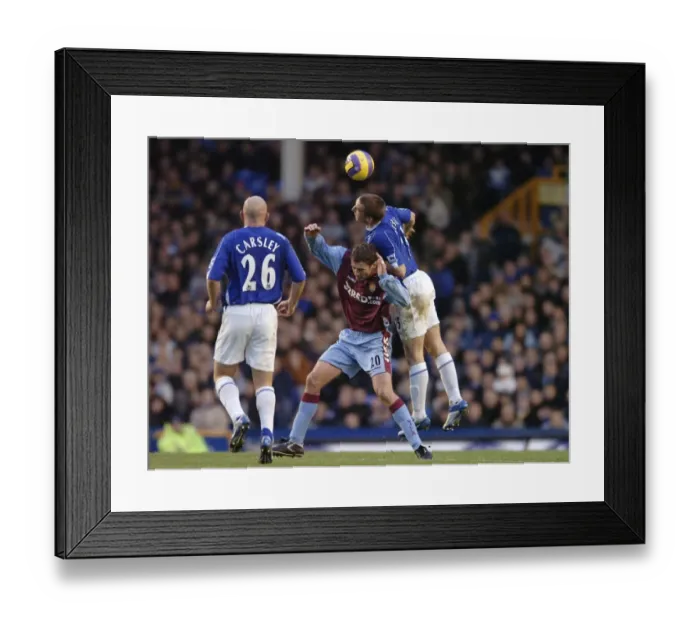 Framed Print : Everton v Aston Villa Alan Stubbs and Chris Sutton - Aston Villa battle for the ball Framed Print : Everton v Aston Villa Alan Stubbs and Chris Sutton - Aston Villa battle for the ball