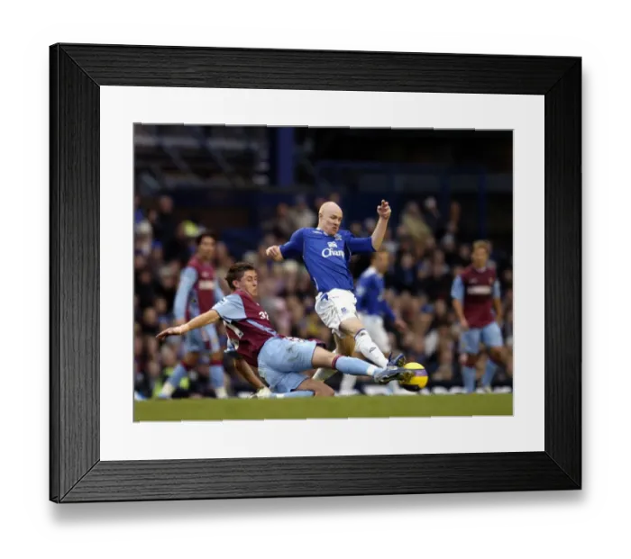 Framed Print : Everton v Aston Villa Andy johnson in action against Gary Cahill Framed Print : Everton v Aston Villa Andy johnson in action against Gary Cahill