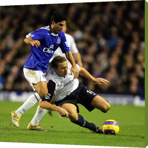 Everton v Bolton - Evertons Mikel Arteta and Boltons Kevin Davies in action