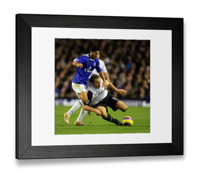 Framed Print : Everton v Bolton - Evertons Mikel Arteta and Boltons Kevin Davies in action Framed Print : Everton v Bolton - Evertons Mikel Arteta and Boltons Kevin Davies in action