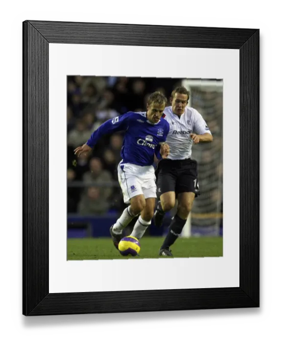 Framed Print : Everton v Bolton - Evertons Phil Neville and Boltons Kevin Davies Framed Print : Everton v Bolton - Evertons Phil Neville and Boltons Kevin Davies