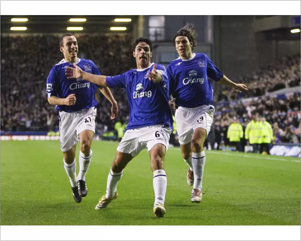 Football - Everton v Bolton Wanderers FA Barclays Premiership - Goodison Park - 06  /  07 - 18  /  11  /  06 Evertons Mikel Arteta celebrates after scoring the first goal with Nuno Valente and Leon Osman Mandatory Credit: Action Images  /  Carl Recine