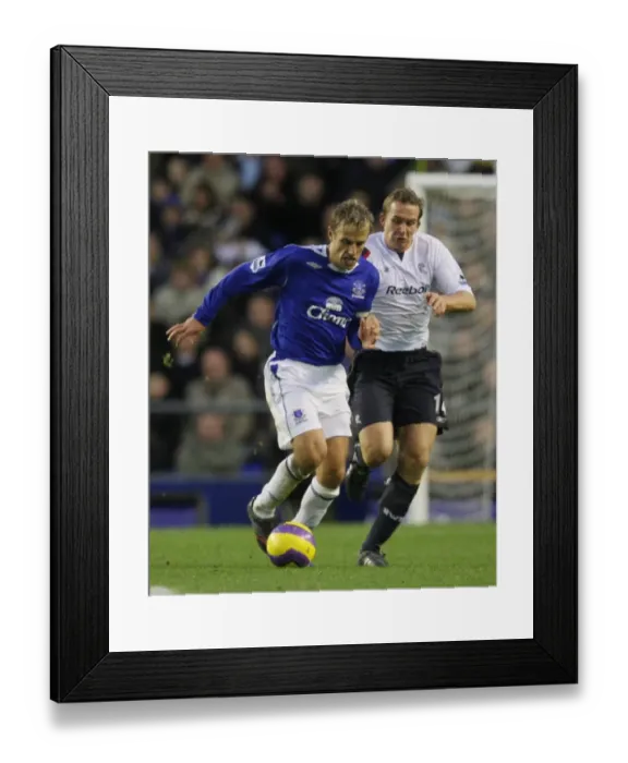 Framed Print : Phil Neville vs. Kevin Davies: A Battle at Goodison Park - Everton vs. Bolton, FA Barclays Premiership (Neville vs. Davies, Everton v Bolton) Framed Print : Phil Neville vs. Kevin Davies: A Battle at Goodison Park - Everton vs. Bolton, FA Barclays Premiership (Neville vs. Davies, Everton v Bolton)