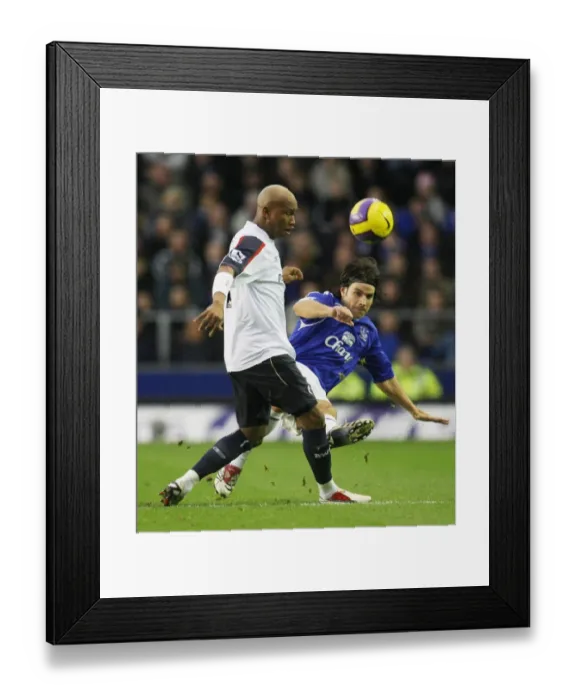 Framed Print : Nuno Valente vs. El Hadji Diouf: A Clash of Stars in Everton vs. Bolton (06 / 11 / 06, FA Barclays Premiership, Goodison Park)