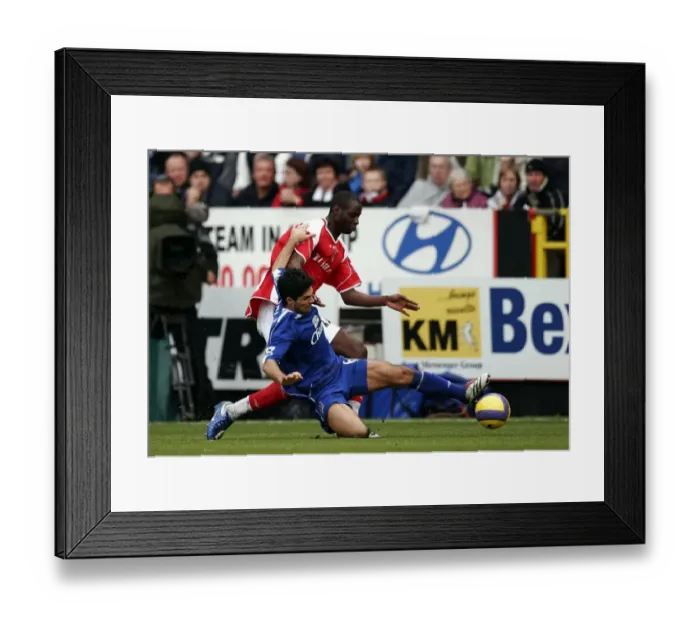 Framed Print : Mikel Arteta vs. Djimi Traore: The Intense Clash at Charlton vs. Everton Framed Print : Mikel Arteta vs. Djimi Traore: The Intense Clash at Charlton vs. Everton