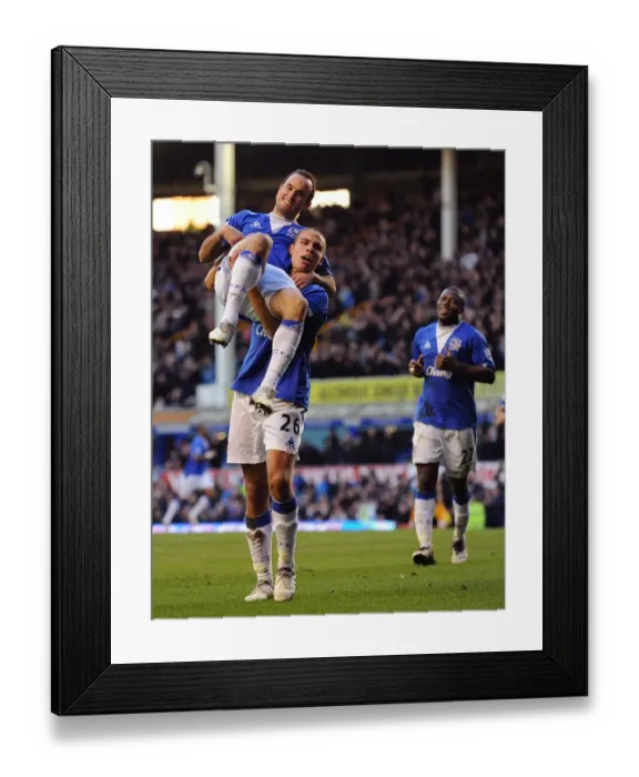 Framed Print : Everton's Unforgettable Moment: Donovan's Fourth Goal Celebration with Rodwell at Goodison Park Framed Print : Everton's Unforgettable Moment: Donovan's Fourth Goal Celebration with Rodwell at Goodison Park