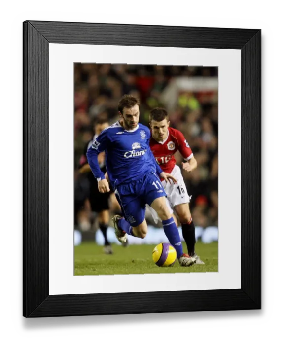 Framed Print : James McFadden vs. Michael Carrick: A Clash of Football Giants (Manchester United vs. Everton, 06 / 07 Season) Framed Print : James McFadden vs. Michael Carrick: A Clash of Football Giants (Manchester United vs. Everton, 06 / 07 Season)