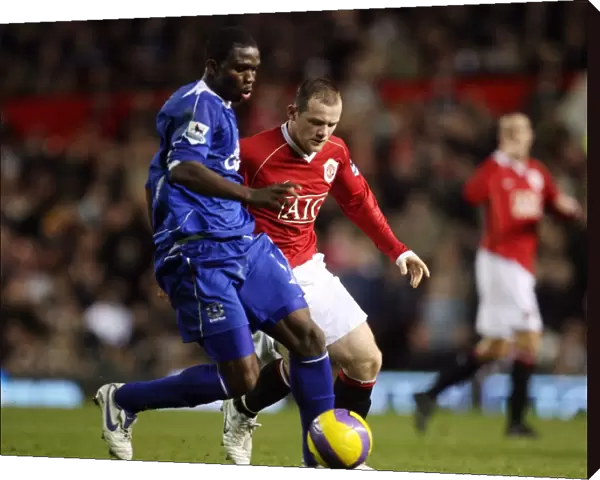 Manchester United v Everton Joseph Yobo Everton in action against Wayne Rooney