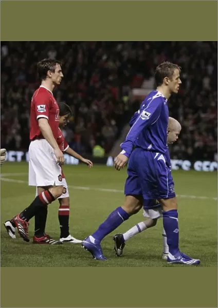 Brothers Neville and Neville lead out Manchester United and Everton