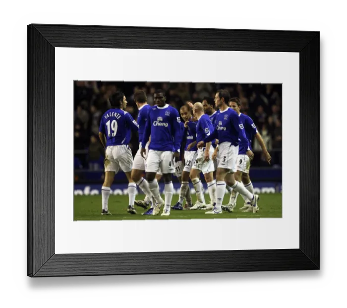 Framed Print : Evertons James Vaughan celebrates with his team mates after scoring his teams second goal Framed Print : Evertons James Vaughan celebrates with his team mates after scoring his teams second goal