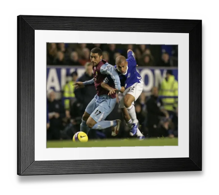 Framed Print : Intense Rivalry: Vaughan vs Mullins Battle for Ball - Everton vs West Ham United Framed Print : Intense Rivalry: Vaughan vs Mullins Battle for Ball - Everton vs West Ham United