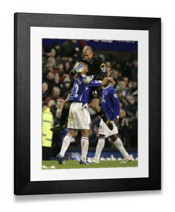 Framed Print : Evertons second goal scorer Vaughan celebrates with Howard following their English Premier League s Framed Print : Evertons second goal scorer Vaughan celebrates with Howard following their English Premier League s