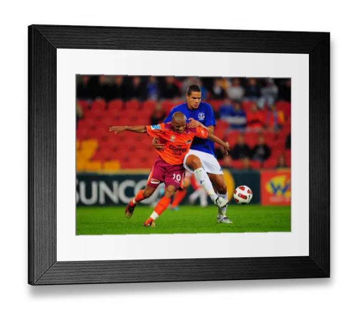 Framed Print : Battle for the Ball: Henrique vs. Rodwell - Everton vs. Brisbane Roar Pre-Season Clash Framed Print : Battle for the Ball: Henrique vs. Rodwell - Everton vs. Brisbane Roar Pre-Season Clash