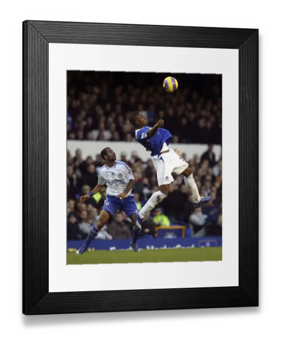 Framed Print : Victor Anichebe vs. Ashley Cole: A Battle at Goodison Park, Everton vs. Chelsea, FA Barclays Premiership, December 17, 2006 Framed Print : Victor Anichebe vs. Ashley Cole: A Battle at Goodison Park, Everton vs. Chelsea, FA Barclays Premiership, December 17, 2006