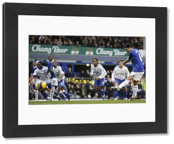 Evertons Arteta scores a penalty against Chelsea during their English Premier League match in Liver