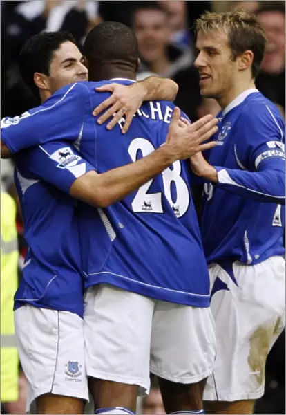 Evertons Arteta celebrates his goal against Chelsea with team mates during their English Premier Le