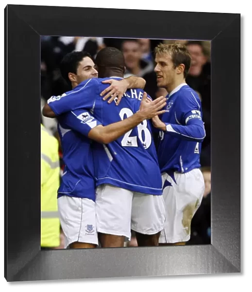 Evertons Arteta celebrates his goal against Chelsea with team mates during their English Premier Le