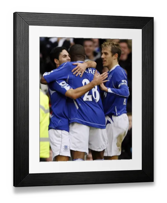 Framed Print : Evertons Arteta celebrates his goal against Chelsea with team mates during their English Premier Le Framed Print : Evertons Arteta celebrates his goal against Chelsea with team mates during their English Premier Le